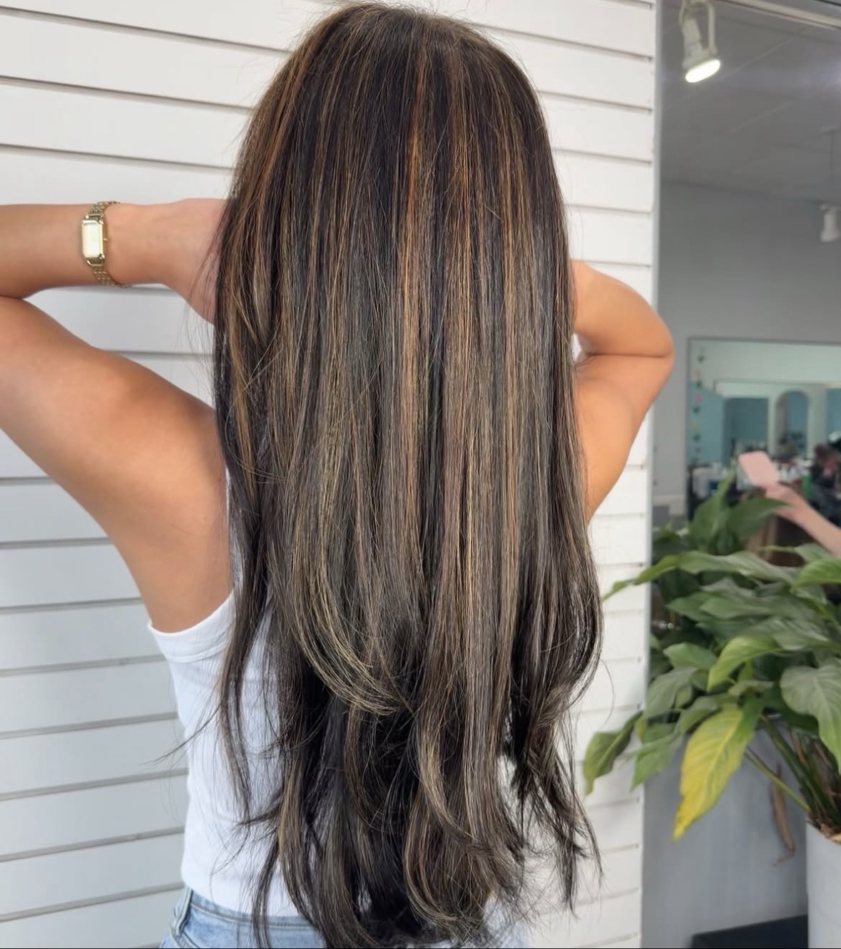 Long brunette hair with caramel dimension by Hair Creations